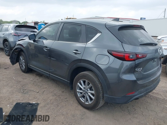 2023 Mazda CX-5 S Carbon Edition z VIN JM3KFBCM7P0226930, wystawiony jako IAAI lot #41939956 z przebiegiem 29 477 mil mil oraz . Historia ofert i sprzedaży dostępna na DreamBid. Obrazek 3.