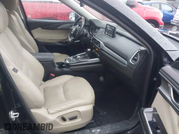 2016 Mazda CX-9 Touring with VIN JM3TCBCY5G0101490, listed as a IAAI auction lot 42062846 with 85,352 mi miles and . Bid and sale history available at DreamBid. Image 5.