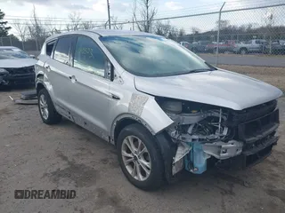 2017 Ford Escape SE z VIN 1FMCU9GDXHUA46689, wystawiony jako IAAI lot #41492523 z przebiegiem 67 401 mil mil oraz . Historia ofert i sprzedaży dostępna na DreamBid. Obrazek 1.