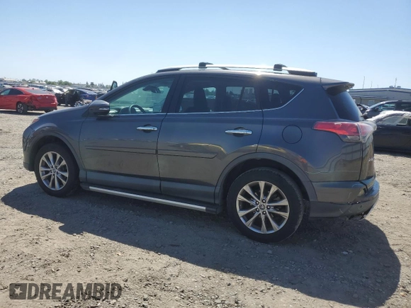 2016 Toyota RAV4 Limited with VIN 2T3DFREV5GW419315, listed as a Copart auction lot 55697735 with 131,036 mi miles and Salvage title. Bid and sale history available at DreamBid. Image 2.