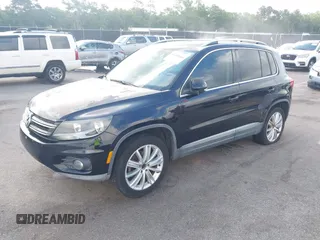 2012 Volkswagen Tiguan SE z VIN WVGAV7AX7CW504391, wystawiony jako IAAI lot #42240604 z przebiegiem 180 330 mil mil oraz . Historia ofert i sprzedaży dostępna na DreamBid. Obrazek 2.