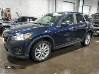 2015 Mazda CX-5 Grand Touring with VIN JM3KE4DY4F0516685, listed as a Copart auction lot 41977405 with 124,106 mi miles and Salvage Title. Bid and sale history available at carsss.com. Image 1.