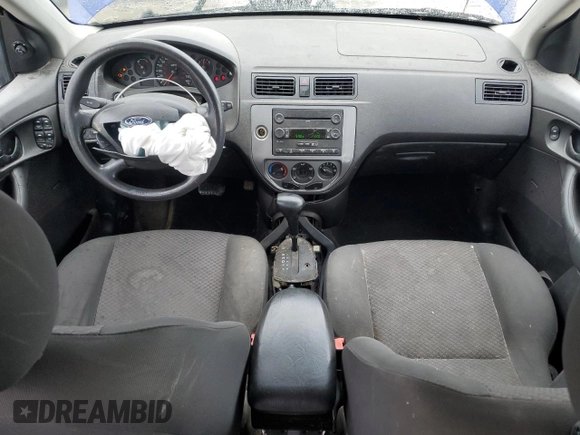 2005 Ford Focus S with VIN 3FAFP37N35R156460, listed as a Copart auction lot 58781635 with 231,066 mi miles and Salvage title. Bid and sale history available at DreamBid. Image 8.