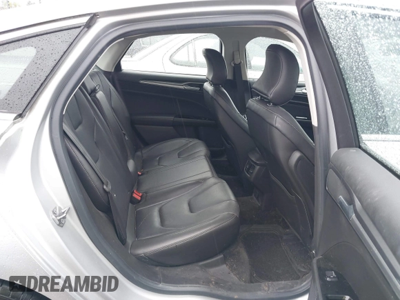 2016 Ford Fusion Titanium with VIN 3FA6P0K91GR360914, listed as a IAAI auction lot 41833665 with 107,367 mi miles and . Bid and sale history available at DreamBid. Image 8.