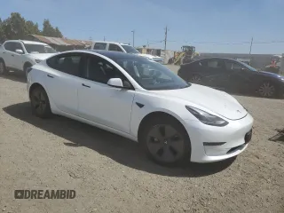 2023 Tesla Model 3 with VIN 5YJ3E1EA0PF623233, listed as a Copart auction lot 55781355 with 26,301 mi miles and Salvage title. Bid and sale history available at DreamBid. Image 4.