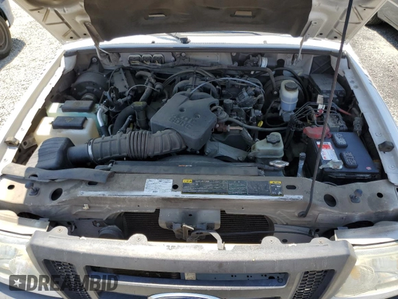 2011 Ford Ranger XL with VIN 1FTKR1EEXBPA10991, listed as a Copart auction lot 58537064 with 102,897 mi miles and Salvage Title. Bid and sale history available at carsss.com. Image 11.