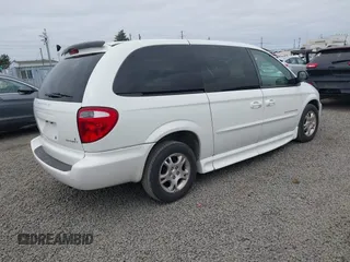 2003 Dodge Caravan Sport z VIN 2D4GP44L13R137970, wystawiony jako IAAI lot #42458333 z przebiegiem 63 431 mil mil oraz . Historia ofert i sprzedaży dostępna na DreamBid. Obrazek 4.
