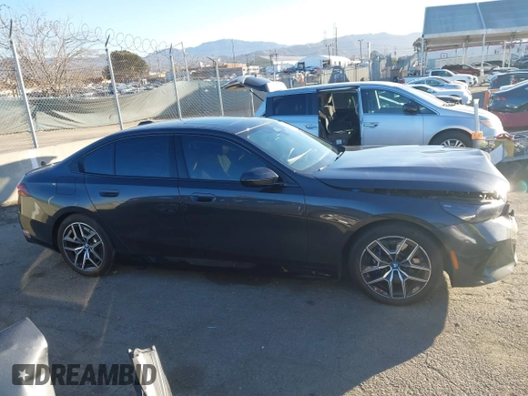 2024 BMW i5 eDrive40 with VIN WBY33FK09RCR42126, listed as a IAAI auction lot 41370577 with 9,601 mi miles and . Bid and sale history available at DreamBid. Image 13.
