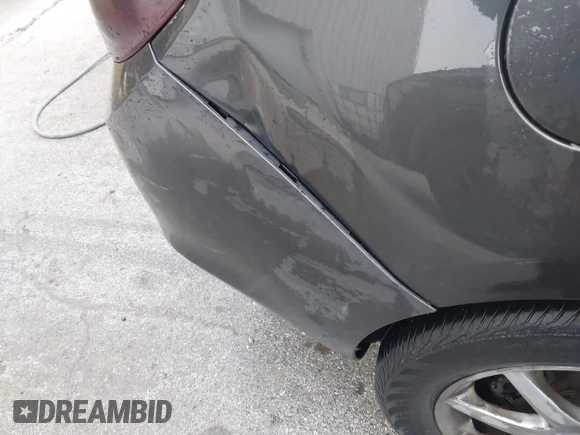 2014 Buick Verano with VIN 1G4PP5SKXE4164468, listed as a IAAI auction lot 41000870 with 205,380 mi miles and . Bid and sale history available at DreamBid. Image 14.