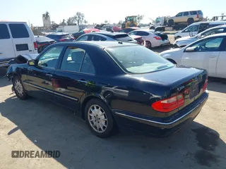 2001 Mercedes-Benz E-Class with VIN WDBJF65J11B368277, listed as a IAAI auction lot 41855716 with 207,864 mi miles. Bid and sale history available at carsss.com. Image 3.