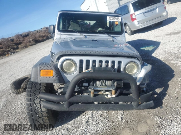 2005 Jeep Wrangler Sport with VIN 1J4FA49S05P375785, listed as a Copart auction lot 42350995 with 0 mi miles and Salvage Title. Bid and sale history available at carsss.com. Image 5.