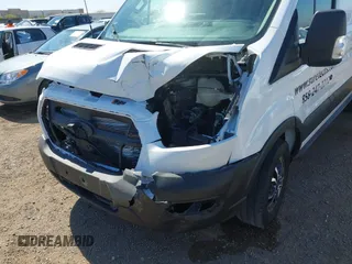 2021 Ford Transit with VIN 1FTBR1YG6MKA39997, listed as a IAAI auction lot 42228463 with 38,559 mi miles and . Bid and sale history available at DreamBid. Image 6.