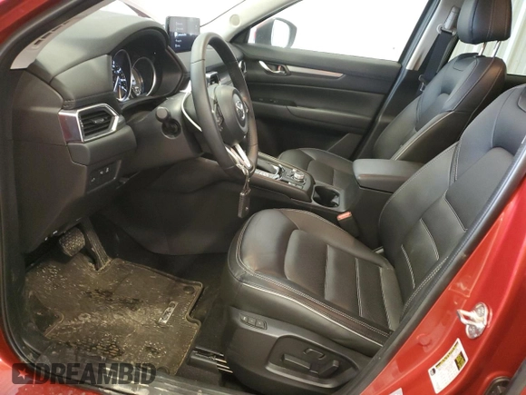 2024 Mazda CX-5 S Carbon Edition z VIN JM3KFBCL5R0418602, wystawiony jako Copart lot #58532005 z przebiegiem 10 564 mil mil oraz Szkoda całkowita • Salvage title. Historia ofert i sprzedaży dostępna na DreamBid. Obrazek 7.