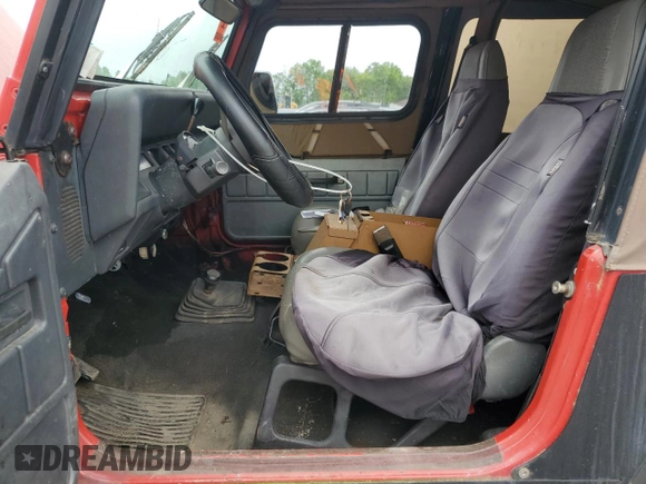 1995 Jeep Wrangler S z VIN 1J4FY19P0SP320982, wystawiony jako Copart lot #58615045 z przebiegiem 156 123 mil mil oraz Czysty tytuł • Clean title. Historia ofert i sprzedaży dostępna na DreamBid. Obrazek 7.