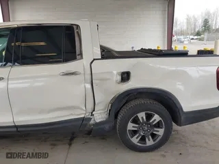 2017 Honda Ridgeline RTL-E with VIN 5FPYK3F7XHB030551, listed as a IAAI auction lot 41903844 with 153,594 mi miles. Bid and sale history available at carsss.com. Image 6.
