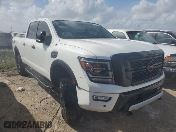 2021 Nissan Titan SV z VIN 1N6AA1FB2MN514566, wystawiony jako Copart lot #75194294 z przebiegiem 34 987 mil mil oraz Nie do naprawy • Non repairable. Historia ofert i sprzedaży dostępna na DreamBid. Obrazek 4.