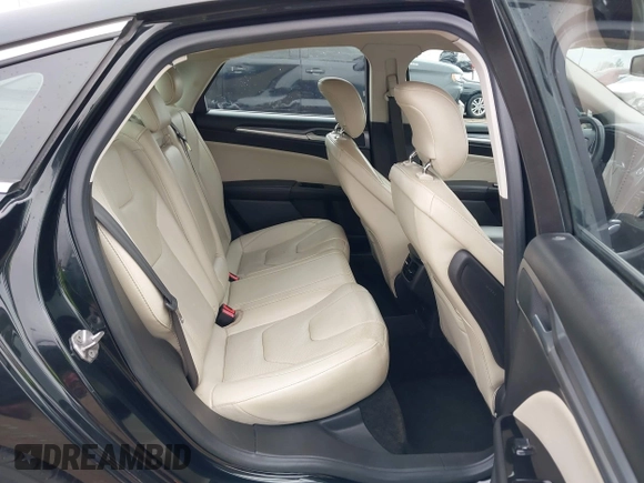 2014 Ford Fusion Titanium with VIN 3FA6P0K9XER364392, listed as a IAAI auction lot 41642439 with 130,302 mi miles and . Bid and sale history available at DreamBid. Image 8.