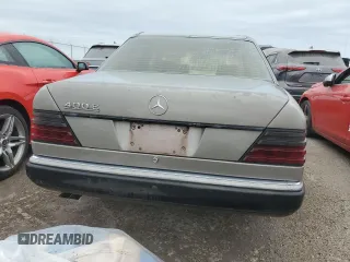 1993 Mercedes-Benz 400 with VIN WDBEA34EXPB944380, listed as a Copart auction lot 73791114 with 143,014 mi miles and Salvage Title. Bid and sale history available at carsss.com. Image 6.
