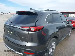 2023 Mazda CX-9 Grand Touring z VIN JM3TCBDY0P0631395, wystawiony jako IAAI lot #41449555 z przebiegiem 17 721 mil mil oraz . Historia ofert i sprzedaży dostępna na DreamBid. Obrazek 4.