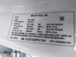 2023 Tesla Model 3 z VIN 5YJ3E1EA0PF611244, wystawiony jako IAAI lot #41455102 z przebiegiem 21 867 mil mil oraz . Historia ofert i sprzedaży dostępna na DreamBid. Obrazek 9.