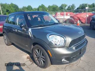 2014 MINI Countryman S with VIN WMWZC5C56EWP36719, listed as a IAAI auction lot 42796859 with 133,003 mi miles and . Bid and sale history available at DreamBid. Image 1.
