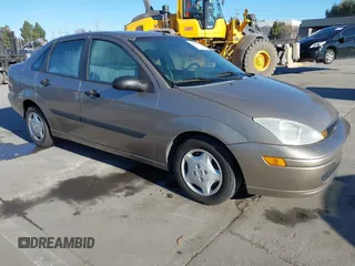 2003 Ford Focus z VIN 1FAFP33Z73W220938, wystawiony jako IAAI lot #41287185 z przebiegiem 223 915 mil mil oraz . Historia ofert i sprzedaży dostępna na DreamBid. Obrazek 1.