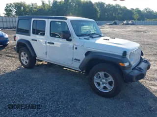 2023 Jeep Wrangler Willys with VIN 1C4HJXDG1PW531053, listed as a IAAI auction lot 42266643 with 28,506 mi miles and . Bid and sale history available at DreamBid. Image 1.