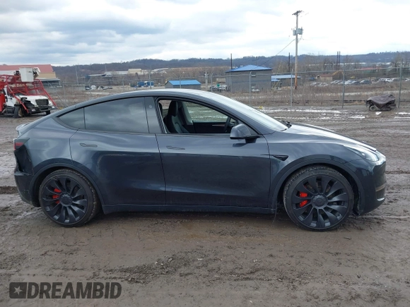 2024 Tesla Model Y Performance with VIN 7SAYGDEF7RF020203, listed as a IAAI auction lot 41639077 with 14,493 mi miles and . Bid and sale history available at DreamBid. Image 13.