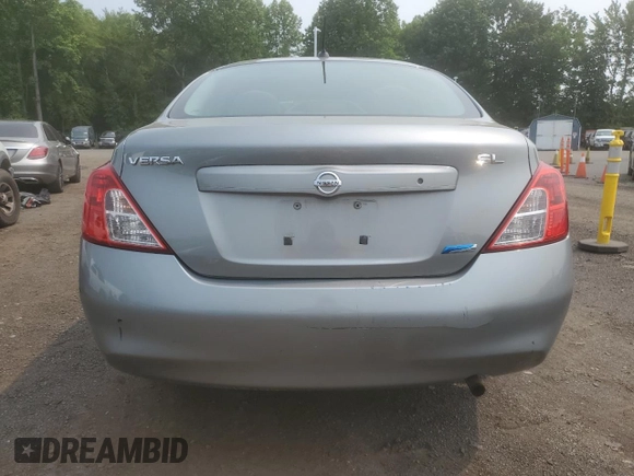 2012 Nissan Versa SV z VIN 3N1CN7AP4CL928388, wystawiony jako Copart lot #59382405 z przebiegiem 198 767 mil mil oraz Szkoda całkowita • Salvage title. Historia ofert i sprzedaży dostępna na DreamBid. Obrazek 6.