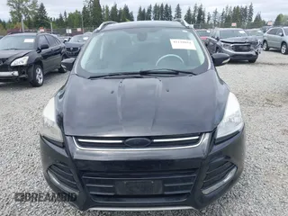 2014 Ford Escape Titanium with VIN 1FMCU9J95EUD60587, listed as a IAAI auction lot 42129854 with 155,559 mi miles and . Bid and sale history available at DreamBid. Image 12.