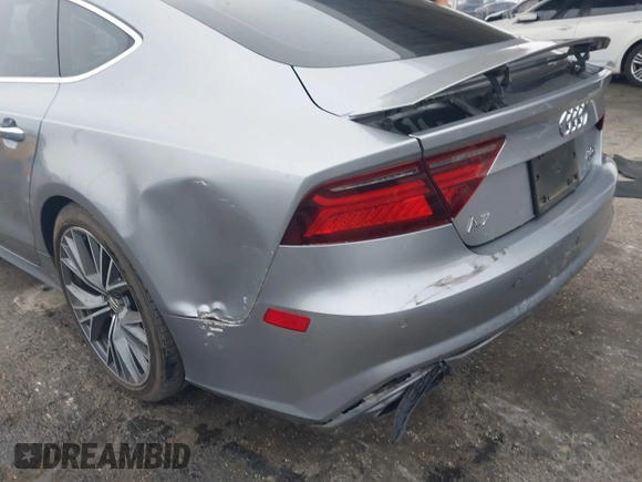2016 Audi A7 3.0 Premium Plus with VIN WAUWGAFC0GN003357, listed as a IAAI auction lot 41468854 with 62,590 mi miles. Bid and sale history available at carsss.com. Image 6.