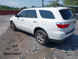 2013 Dodge Durango Crew with VIN 1C4RDJDG1DC538803, listed as a IAAI auction lot 42464941 with 181,988 mi miles and . Bid and sale history available at DreamBid. Image 3.