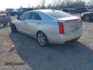 2015 Cadillac ATS Luxury RWD z VIN 1G6AB5RA5F0102154, wystawiony jako IAAI lot #41798788 z przebiegiem 97 723 mil mil oraz . Historia ofert i sprzedaży dostępna na DreamBid. Obrazek 3.