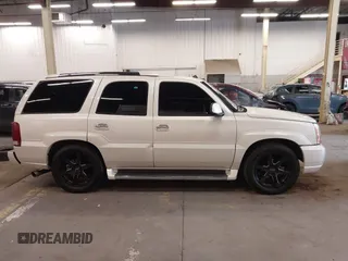 2003 Cadillac Escalade z VIN 1GYEK63N53R162632, wystawiony jako IAAI lot #41542627 z przebiegiem 147 577 mil mil oraz . Historia ofert i sprzedaży dostępna na DreamBid. Obrazek 13.