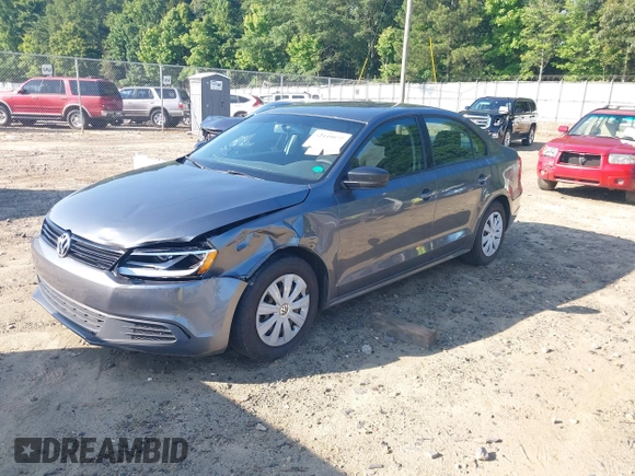 2014 Volkswagen Jetta S z VIN 3VW2K7AJ3EM303858, wystawiony jako IAAI lot #42449072 z przebiegiem 171 959 mil mil oraz . Historia ofert i sprzedaży dostępna na DreamBid. Obrazek 17.