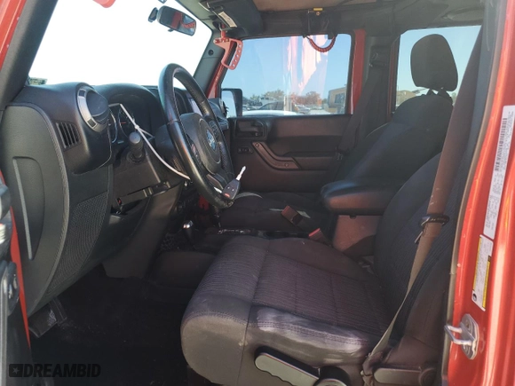 2012 Jeep Wrangler Unlimited Sport with VIN 1C4BJWDG4CL212726, listed as a Copart auction lot 49851525 with 125,566 mi miles and Salvage Title. Bid and sale history available at carsss.com. Image 7.