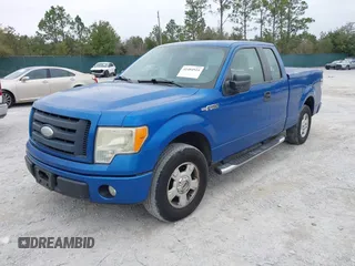 2009 Ford F-150 STX with VIN 1FTRX12W89KB25047, listed as a IAAI auction lot 41484924 with 310,768 mi miles. Bid and sale history available at carsss.com. Image 2.