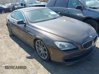 2012 BMW 6 Series 650i z VIN WBALX3C57CC528832, wystawiony jako IAAI lot #41779268 z przebiegiem 75 119 mil mil oraz . Historia ofert i sprzedaży dostępna na DreamBid. Obrazek 1.