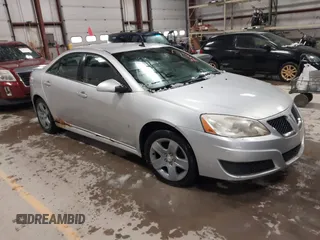 2009 Pontiac G6 1SB z VIN 1G2ZJ57B794268837, wystawiony jako IAAI lot #41854342 z przebiegiem 155 689 mil mil oraz . Historia ofert i sprzedaży dostępna na DreamBid. Obrazek 1.
