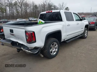2018 GMC Sierra 1500 SLT z VIN 3GTU2NEC1JG402263, wystawiony jako IAAI lot #41786328 z przebiegiem 100 097 mil mil oraz . Historia ofert i sprzedaży dostępna na DreamBid. Obrazek 4.