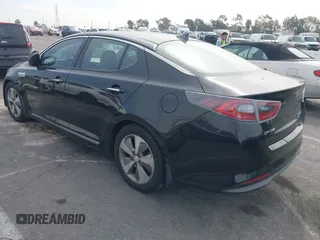 2015 Kia Optima Hybrid EX with VIN KNAGN4ADXF5080070, listed as a IAAI auction lot 41666446 with 119,845 mi miles. Bid and sale history available at carsss.com. Image 3.