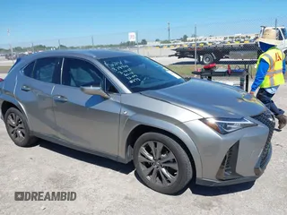 2022 Lexus UX with VIN JTHE3JBH3N2056014, listed as a IAAI auction lot 41832434 with 25,693 mi miles. Bid and sale history available at carsss.com. Image 1.