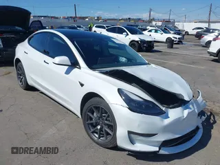 2023 Tesla Model 3 z VIN 5YJ3E1EA2PF514871, wystawiony jako IAAI lot #41703073 z przebiegiem 21 227 mil mil oraz . Historia ofert i sprzedaży dostępna na DreamBid. Obrazek 1.