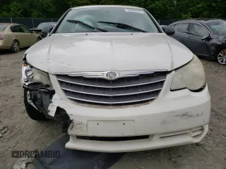 2010 Chrysler Sebring Touring z VIN 1C3CC4FB5AN192786, wystawiony jako Copart lot #56566445 z przebiegiem 194 869 mil mil oraz Szkoda całkowita • Salvage title. Historia ofert i sprzedaży dostępna na DreamBid. Obrazek 5.