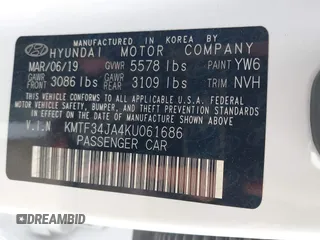 2019 Genesis G90 Premium with VIN KMTF34JA4KU061686, listed as a IAAI auction lot 42157076 with 27,359 mi miles and . Bid and sale history available at DreamBid. Image 9.