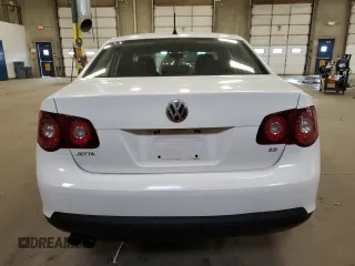 2010 Volkswagen Jetta S with VIN 3VWJZ7AJ5AM004163, listed as a Copart auction lot 54312695 with 148,160 mi miles and Salvage title. Bid and sale history available at DreamBid. Image 6.