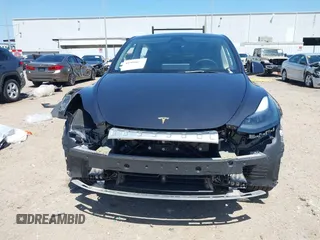2024 Tesla Model Y with VIN 7SAYGDED2RF040745, listed as a IAAI auction lot 41986613 with 9,778 mi miles and . Bid and sale history available at DreamBid. Image 12.