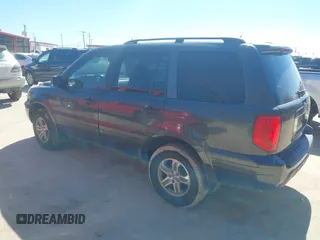 2004 Honda Pilot EX with VIN 2HKYF18574H532409, listed as a IAAI auction lot 41701760 with 302,949 mi miles and . Bid and sale history available at carsss.com. Image 3.