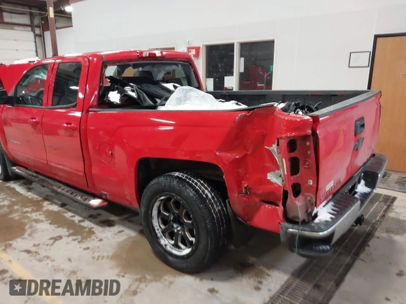2018 Chevrolet Silverado 1500 LT with VIN 1GCRCREH4JZ164236, listed as a IAAI auction lot 41394225 with 64,639 mi miles and . Bid and sale history available at DreamBid. Image 3.