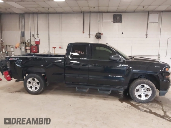 2017 Chevrolet Silverado 1500 LT with VIN 1GCVKREC0HZ384747, listed as a IAAI auction lot 37311343 with 67,390 mi miles. Bid and sale history available at carsss.com. Image 14.